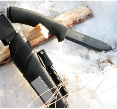 Carbon Steel Bushcraft Knives: The Rust Trade-Off, Scandi Grinds, and Which Handles Survive Real Field Use